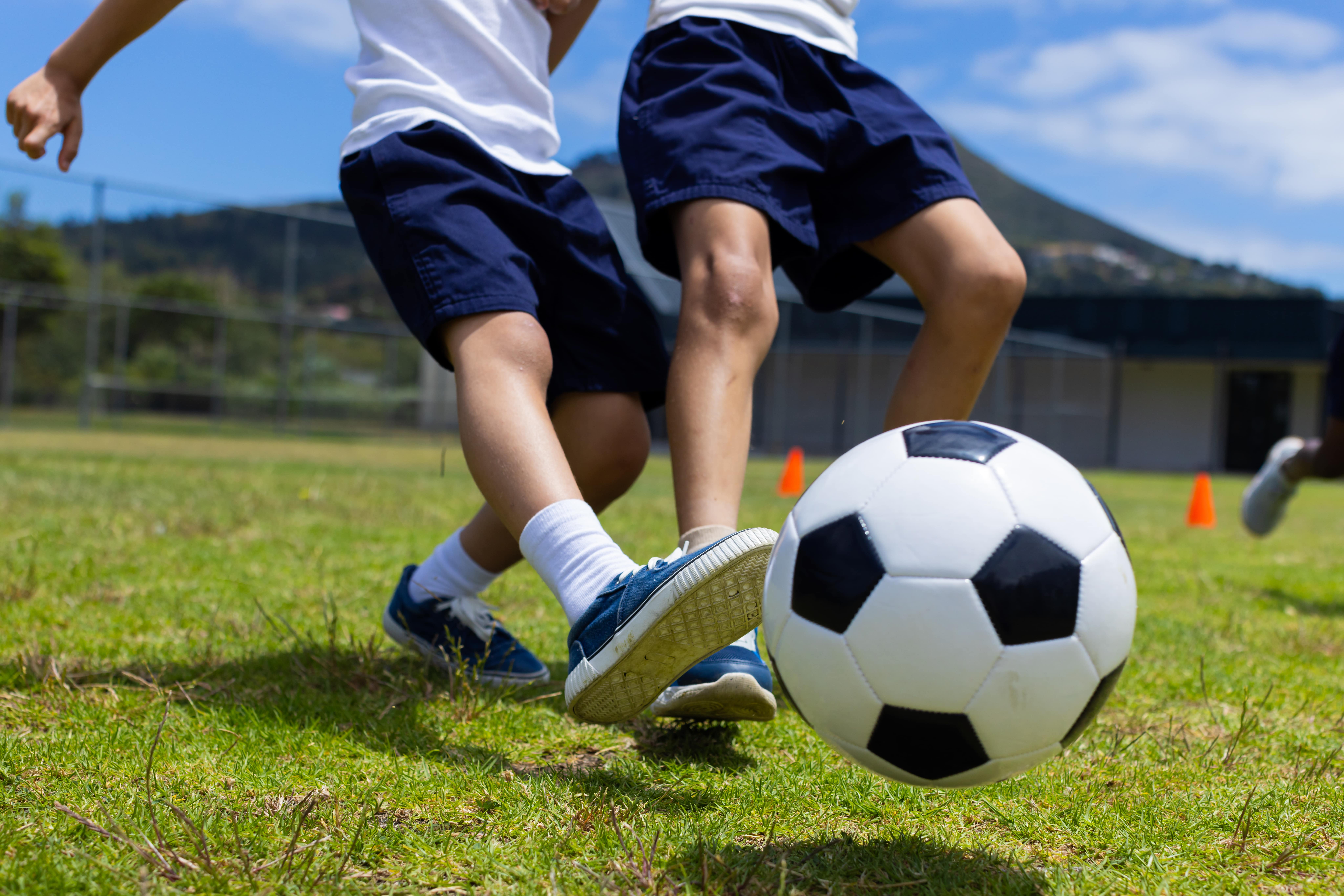 Kids playing football